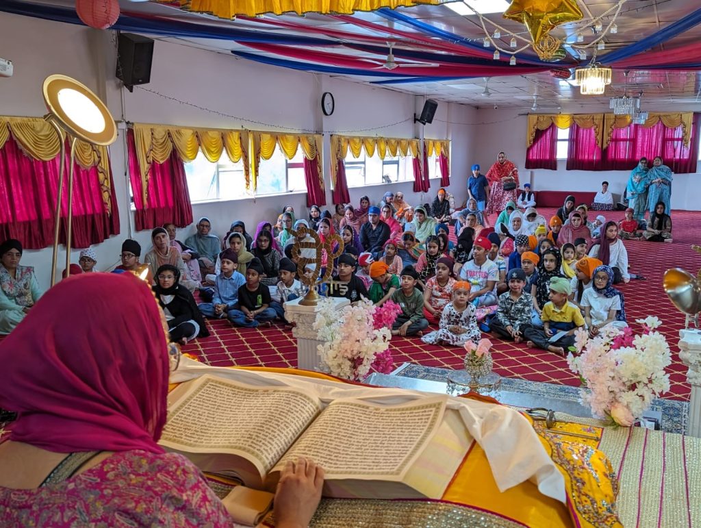A celebration before Sri Guru Granth Sahib Ji
